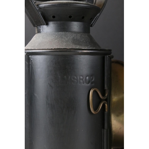 20 - A collection of three vintage railway lamps to include two British Rail and one London Midland Scott... 