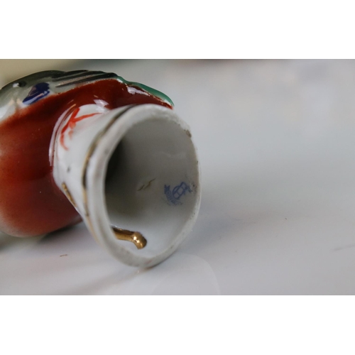 29 - A collection of mixed ceramics and glassware to include Sylvac, Wade and Royal Doulton.