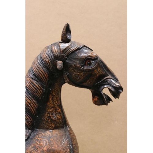 43 - Wooden Rocking Horse raised on a bow rocker, 124cms long x 85cms high