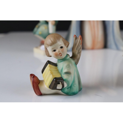 8 - Six Goebel Hummel Nativity Figures including Joseph, Mary, Baby Jesus, Lost Sheep, Heavenly Angel an... 