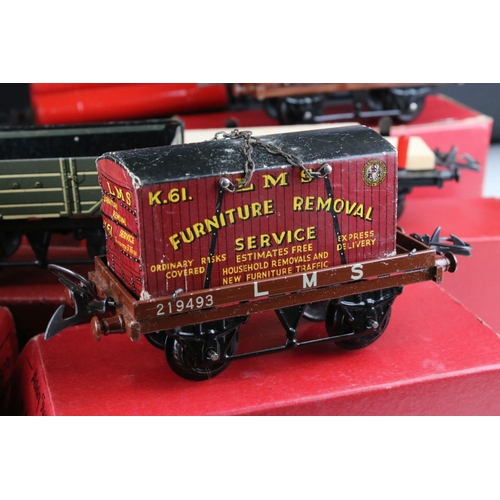 128 - 10 Boxed Hornby O gauge items of rolling stock to include No 1 Goods Van LMS, Goods Brake Van, Flat ... 