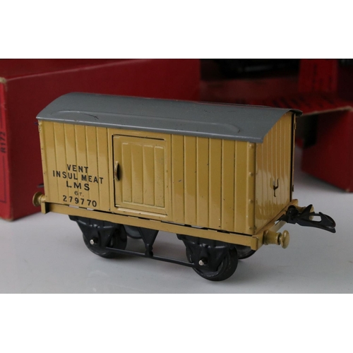 128 - 10 Boxed Hornby O gauge items of rolling stock to include No 1 Goods Van LMS, Goods Brake Van, Flat ... 