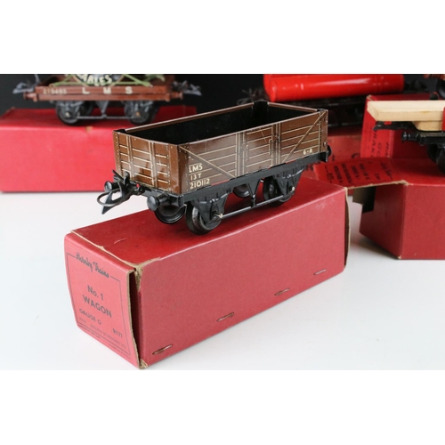 128 - 10 Boxed Hornby O gauge items of rolling stock to include No 1 Goods Van LMS, Goods Brake Van, Flat ... 