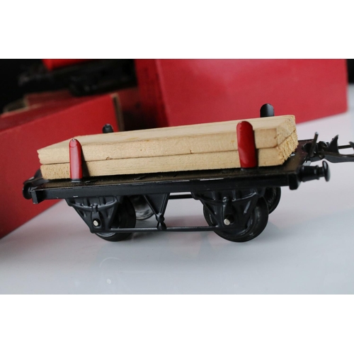 128 - 10 Boxed Hornby O gauge items of rolling stock to include No 1 Goods Van LMS, Goods Brake Van, Flat ... 