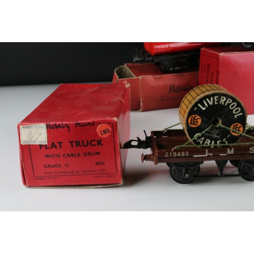 128 - 10 Boxed Hornby O gauge items of rolling stock to include No 1 Goods Van LMS, Goods Brake Van, Flat ... 