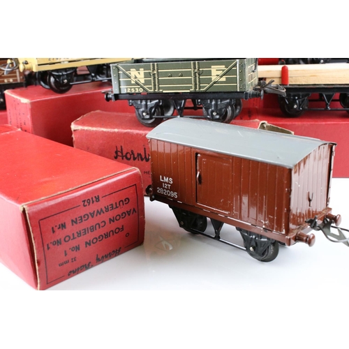 128 - 10 Boxed Hornby O gauge items of rolling stock to include No 1 Goods Van LMS, Goods Brake Van, Flat ... 