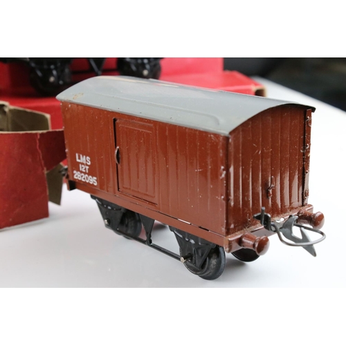 128 - 10 Boxed Hornby O gauge items of rolling stock to include No 1 Goods Van LMS, Goods Brake Van, Flat ... 