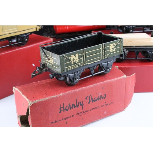 128 - 10 Boxed Hornby O gauge items of rolling stock to include No 1 Goods Van LMS, Goods Brake Van, Flat ... 