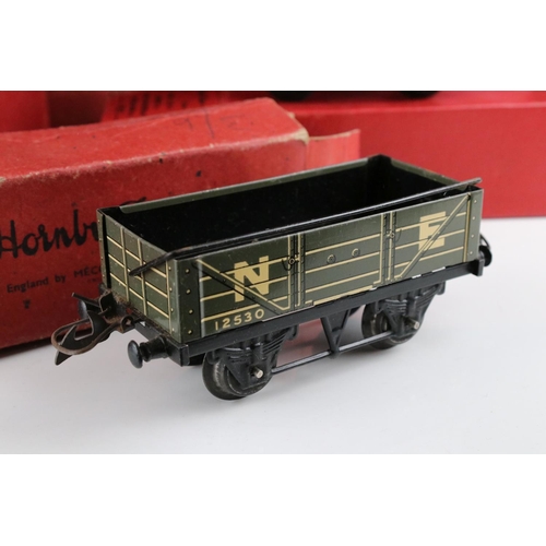 128 - 10 Boxed Hornby O gauge items of rolling stock to include No 1 Goods Van LMS, Goods Brake Van, Flat ... 