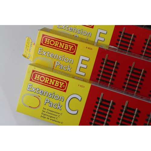 130 - Five boxed Hornby OO gauge Track Packs to include R8017, Extension Pack D, 2 x Extension Pack E & Ex... 