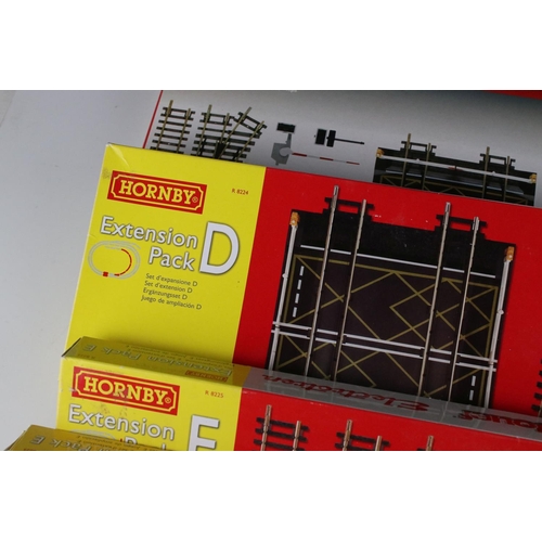 130 - Five boxed Hornby OO gauge Track Packs to include R8017, Extension Pack D, 2 x Extension Pack E & Ex... 