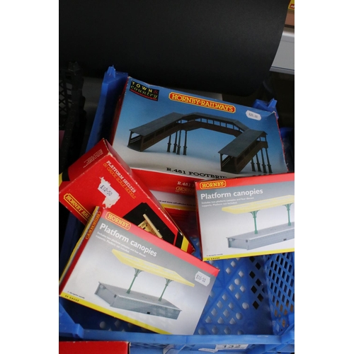 132 - Six boxed Hornby OO gauge trackside accessories to include R481 Footbridge, R8084 TrakMat, 2 x R514 ... 