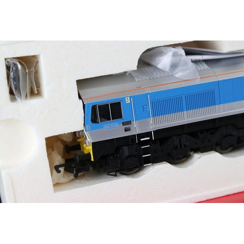 152 - Two boxed Hornby OO gauge DCC Ready locomotives to include R2519 Foster Yeoman Co Co Diesel Electric... 