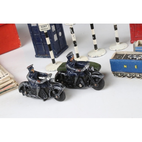 467 - Quantity of vintage card locomotive models a group of Dinky diecast road signs, accessories & Motorb... 