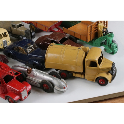 468 - Around 40 mid 20th C play worn Dinky diecast models to include road, commercial and farming models f... 