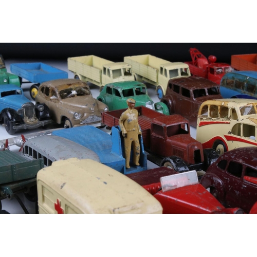 468 - Around 40 mid 20th C play worn Dinky diecast models to include road, commercial and farming models f... 