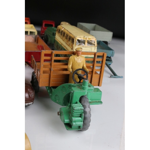 468 - Around 40 mid 20th C play worn Dinky diecast models to include road, commercial and farming models f... 