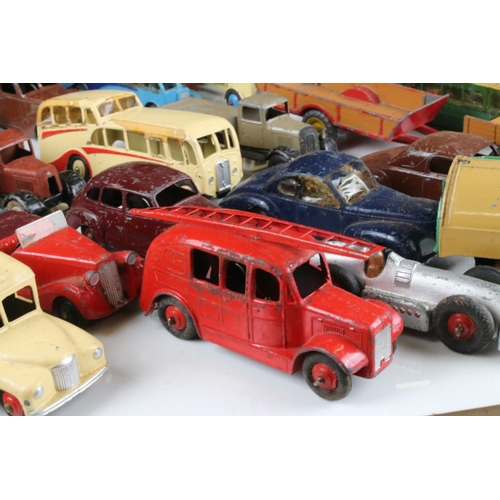 468 - Around 40 mid 20th C play worn Dinky diecast models to include road, commercial and farming models f... 