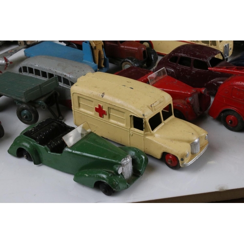 468 - Around 40 mid 20th C play worn Dinky diecast models to include road, commercial and farming models f... 