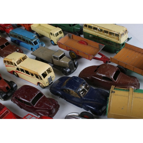 468 - Around 40 mid 20th C play worn Dinky diecast models to include road, commercial and farming models f... 