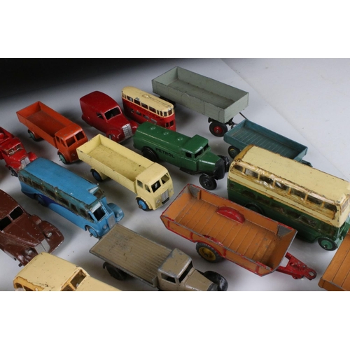 468 - Around 40 mid 20th C play worn Dinky diecast models to include road, commercial and farming models f... 