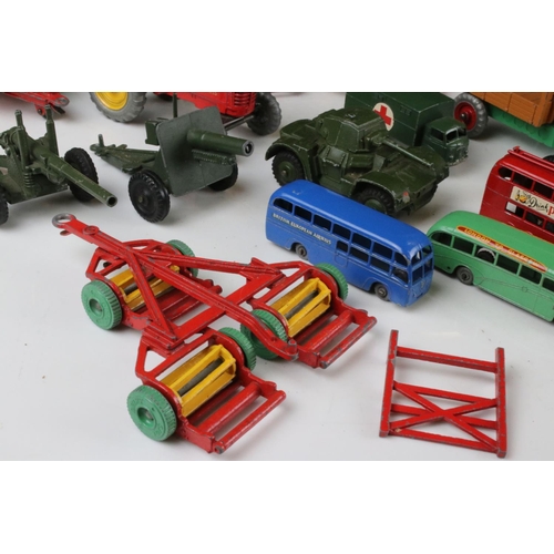 469 - Around 35 mid 20th C play worn diecast models and vehicles to include Dinky & Matchbox featuring mil... 