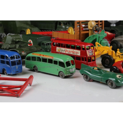 469 - Around 35 mid 20th C play worn diecast models and vehicles to include Dinky & Matchbox featuring mil... 