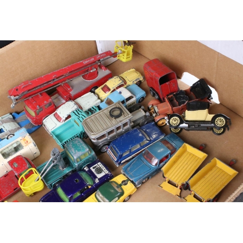 475 - Over 40 play worn mid 20th C Corgi diecast models to include Man From UNCLE Oldsmobile, Smiths Karri... 