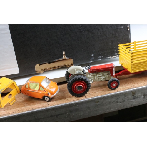 475 - Over 40 play worn mid 20th C Corgi diecast models to include Man From UNCLE Oldsmobile, Smiths Karri... 