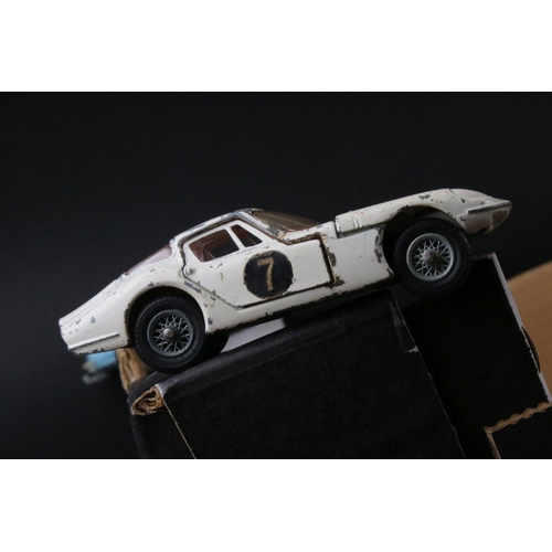 475 - Over 40 play worn mid 20th C Corgi diecast models to include Man From UNCLE Oldsmobile, Smiths Karri... 