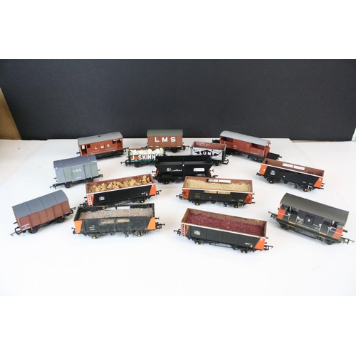 168 - Around 44 OO gauge items of rolling stock to include Hornby, Peco, Bachmann etc, features wagons, tr... 