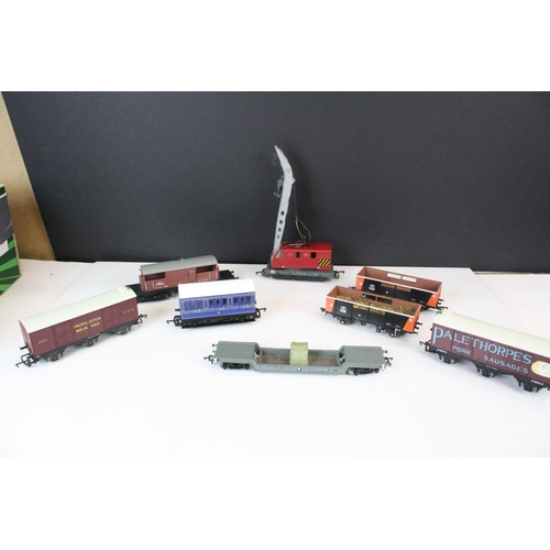 168 - Around 44 OO gauge items of rolling stock to include Hornby, Peco, Bachmann etc, features wagons, tr... 