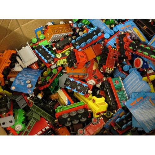 415 - Large quantity of diecast and plastic Thomas the Tank Engine models and carry cases (three boxes)