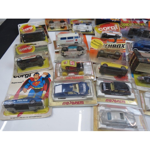 292 - group of approx. 35 diecast models, in blister packs and boxed, to include Corgi, Matchbox & Majoret... 