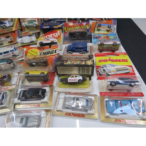 292 - group of approx. 35 diecast models, in blister packs and boxed, to include Corgi, Matchbox & Majoret... 