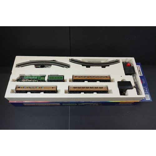 32 - Two boxed Hornby OO gauge electric train sets to include R824 Intercity 225 & R1001 Flying Scotsman,... 