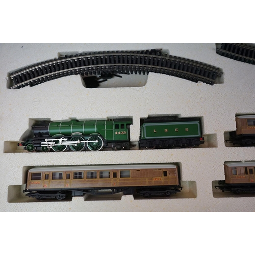 32 - Two boxed Hornby OO gauge electric train sets to include R824 Intercity 225 & R1001 Flying Scotsman,... 