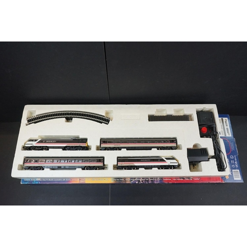 32 - Two boxed Hornby OO gauge electric train sets to include R824 Intercity 225 & R1001 Flying Scotsman,... 