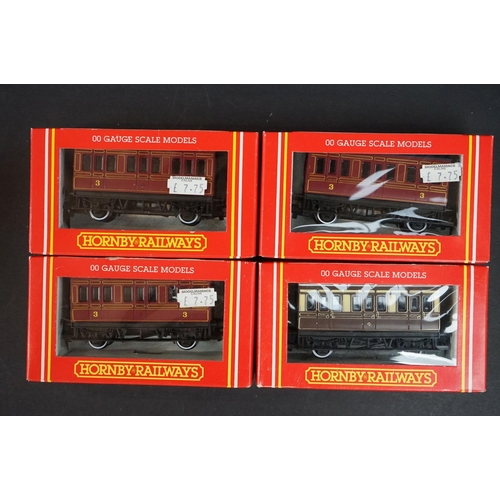 39 - 16 Boxed Hornby OO gauge items of rolling stock to include R233, R223, R162, R174, R162, R600 etc