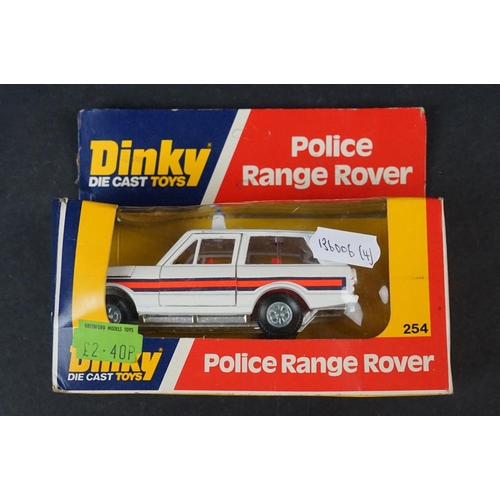 335 - Four boxed diecast Police vehicles, to include Dinky Ford Transit Police Accident Unit 269, Dinky Po... 