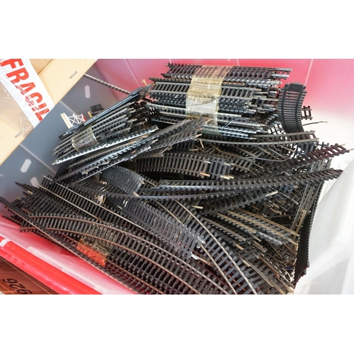 74 - Large quantity of OO gauge model railway track featuring various straights and curves