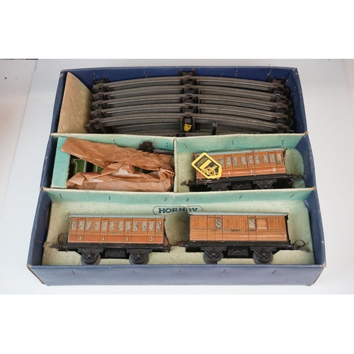 78 - Three boxed Hornby O gauge train sets to include No 101 Tank Passenger with LNER0-4-0 locomotive, M1... 