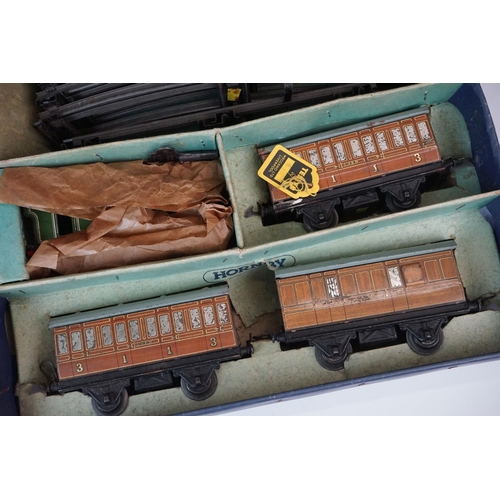 78 - Three boxed Hornby O gauge train sets to include No 101 Tank Passenger with LNER0-4-0 locomotive, M1... 