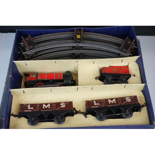 78 - Three boxed Hornby O gauge train sets to include No 101 Tank Passenger with LNER0-4-0 locomotive, M1... 