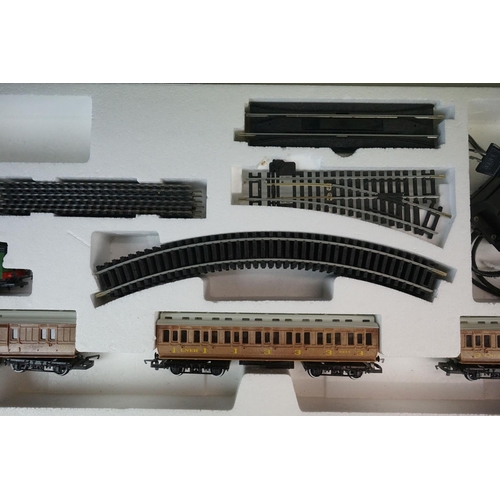 79 - Two boxed Hornby OO gauge electric train sets to include R724 Surburban Passenger and R674 Midnight ... 