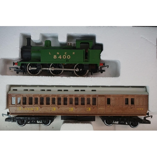 79 - Two boxed Hornby OO gauge electric train sets to include R724 Surburban Passenger and R674 Midnight ... 