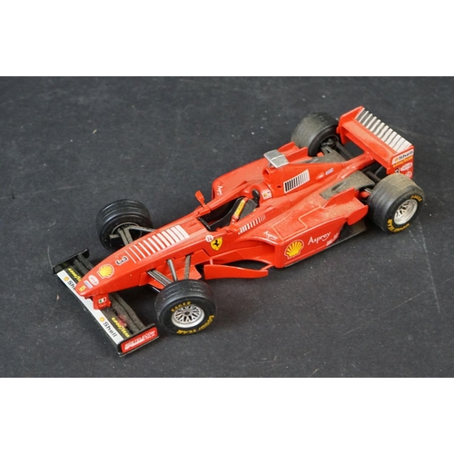 402 - Nine 1/18-1/24 diecast & plastic models to include mainly Burago examples