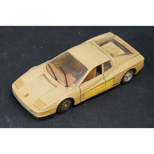 402 - Nine 1/18-1/24 diecast & plastic models to include mainly Burago examples