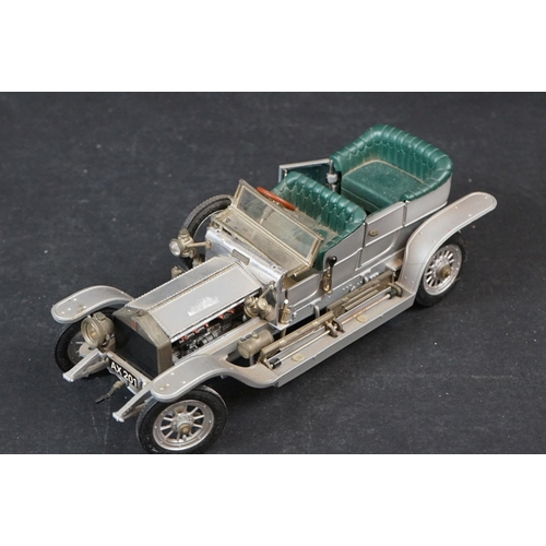 402 - Nine 1/18-1/24 diecast & plastic models to include mainly Burago examples