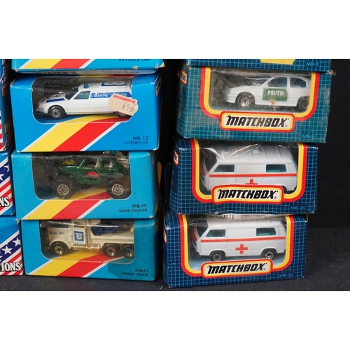 373 - Collection of 20 boxed Matchbox diecast models, mostly police and other commercial vehicles, various... 